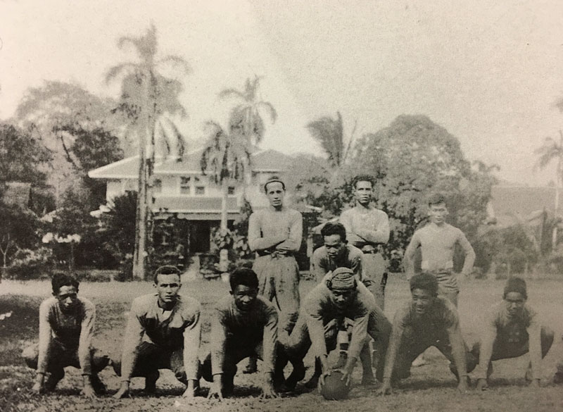 McKinley High School football team — Masayuki standing in the back row, first from the right