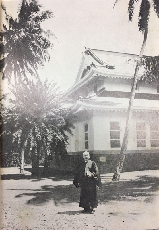 Man standing in front of the new Makiki Christian Church building