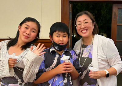 Makiki Christian Church chapel Christmas eve 2024 Children and mother smiling