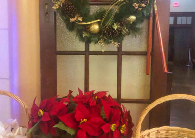 Makiki Christian Church Christmas Eve. Wreath and poinsettia decoration at chapel entrance